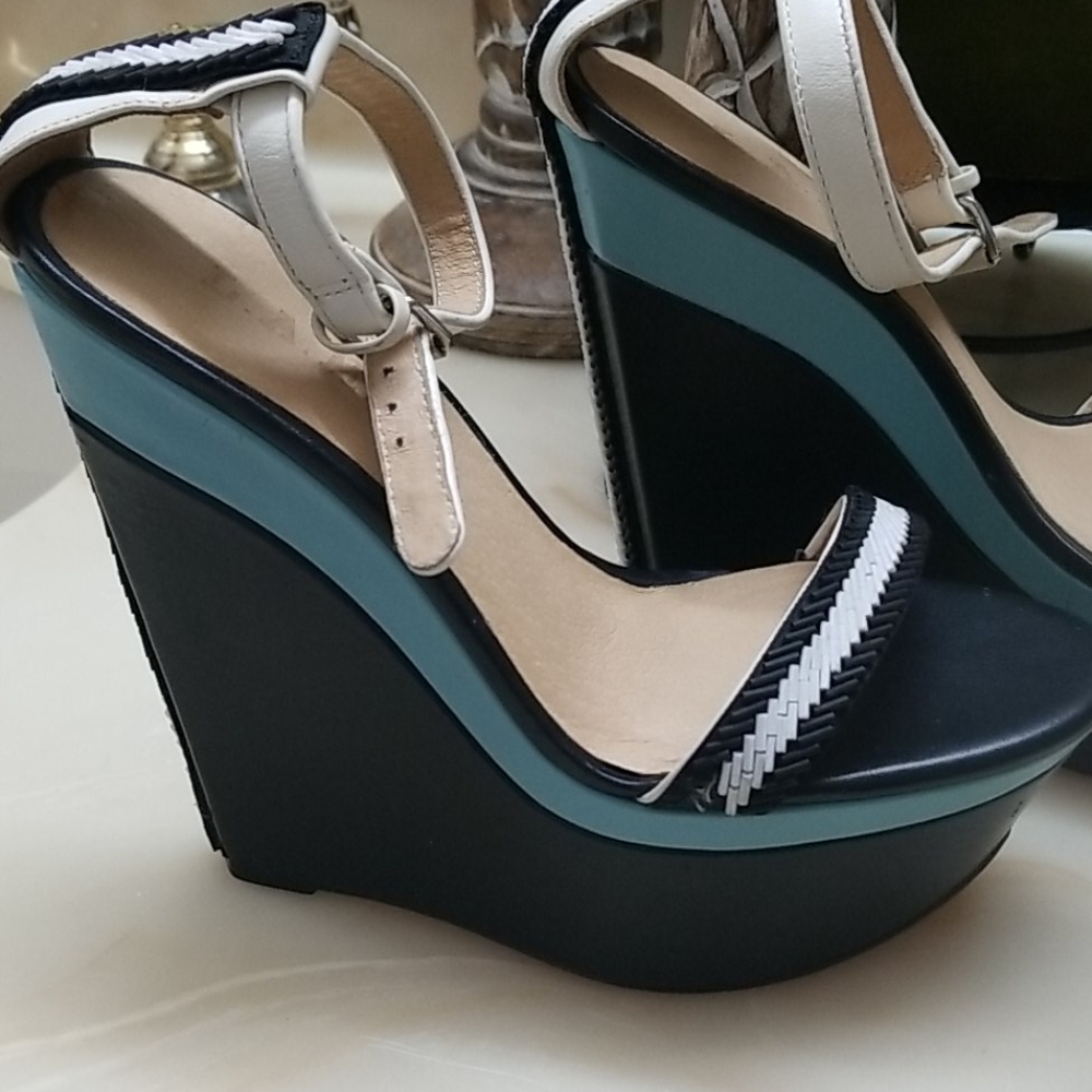 LAMB by Gwen Stefani.  Platform heels.